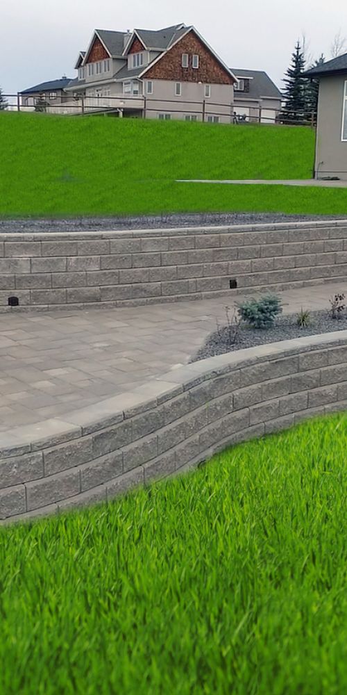 Two retaining walls with a patio and fire pit